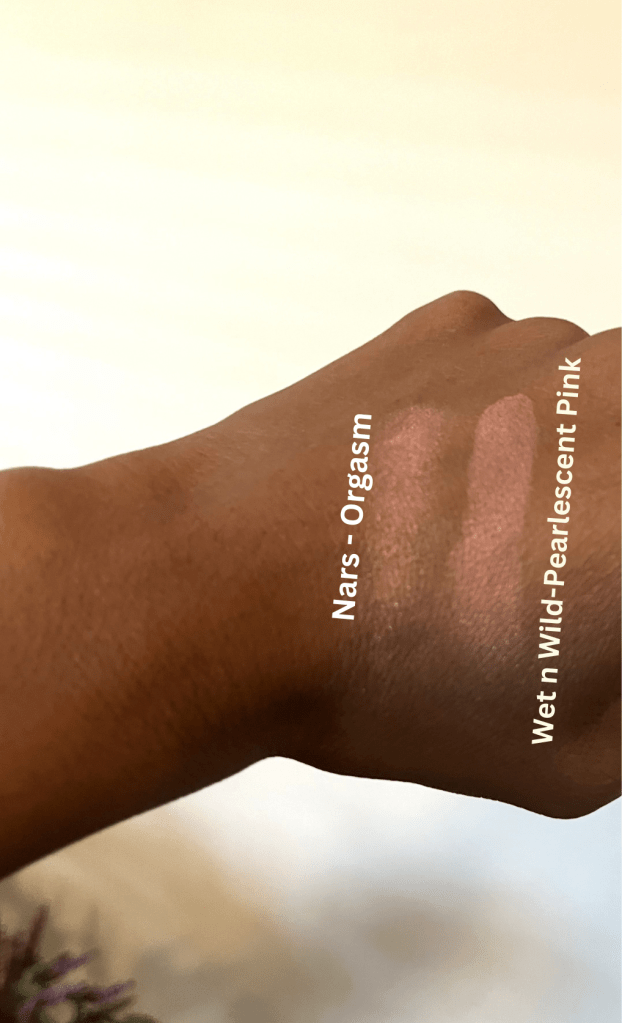 Swatches of Nars Orgasm and Wet n wild Pearlescent Pink on brown skin.