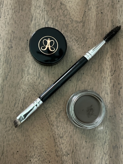 Anastasia Beverly Hills Dip Brow pomade open container with an angled brush.