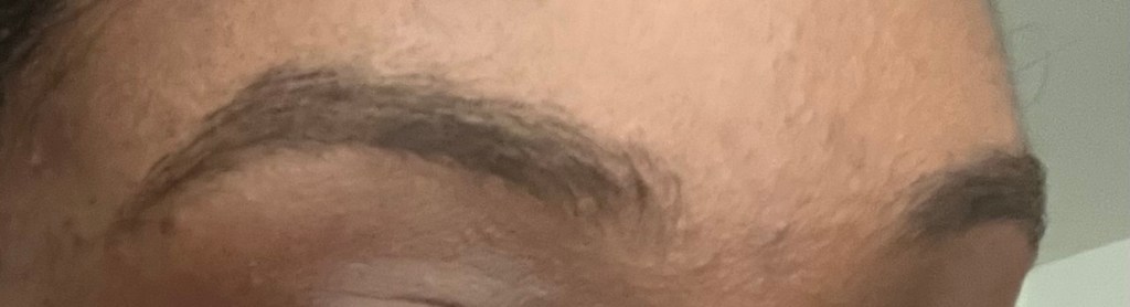 Maybelline Brow Precise Soft Brown on a person with brown skin.