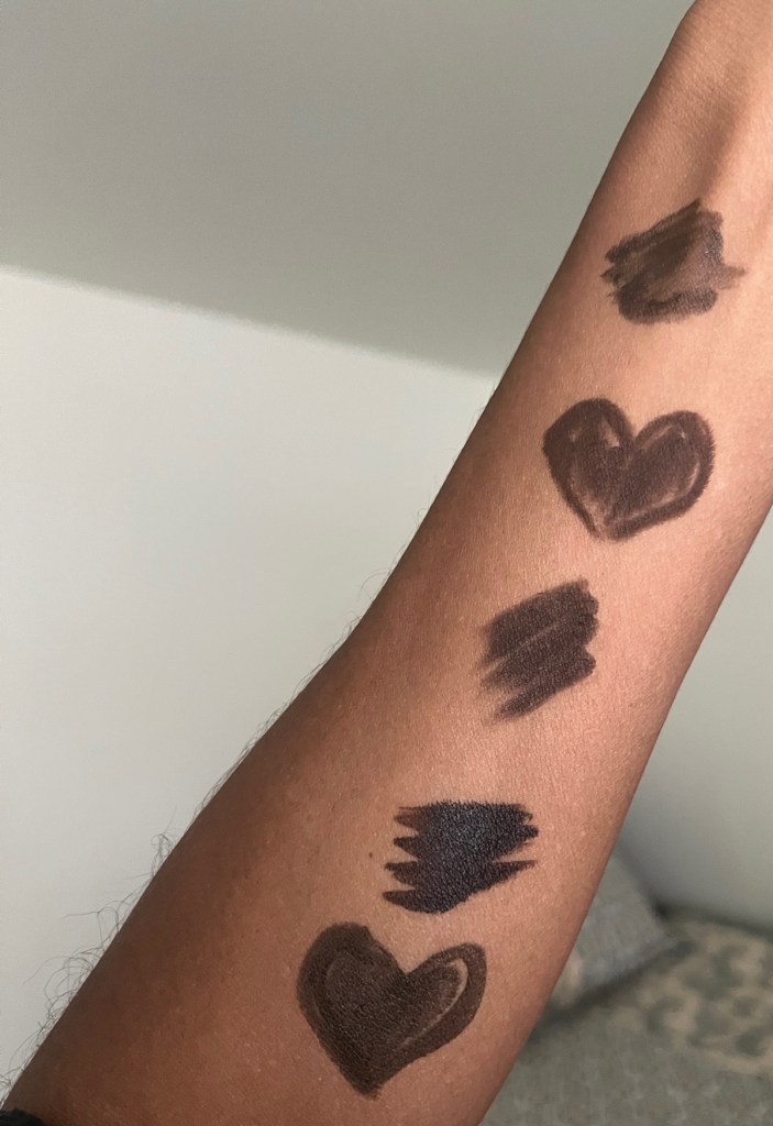 Swatches of the best brown drugstore eyeliners on brown skin. 
 Wet n Wild H2O Proof Liquid Eyeliner (Dark Brown), Wet n Wild Color Icon Kohl Pencil( Simma Brown Now), L.A. Colors Auto Eyeliner (Black Brown), Wet n Wild Proline Felt Tip(Dark Brown), Maybelline Master Precise (Forest Brown)