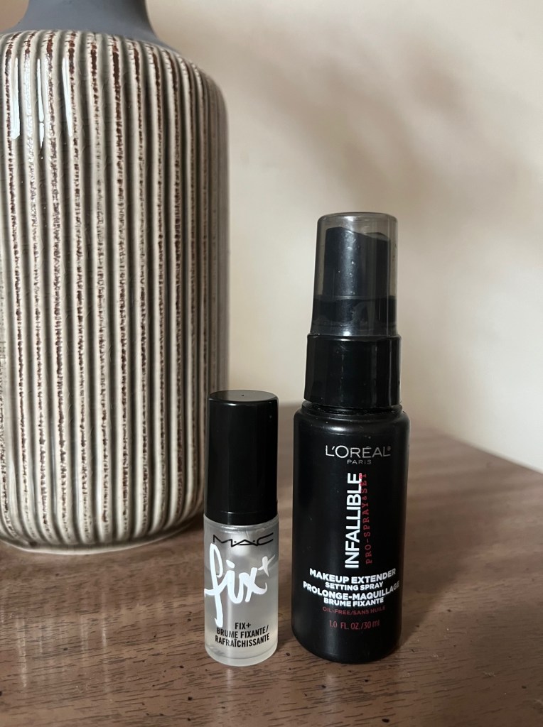 Mac Fix+ small sample sized bottle and L'Oreal Infallible setting spray.