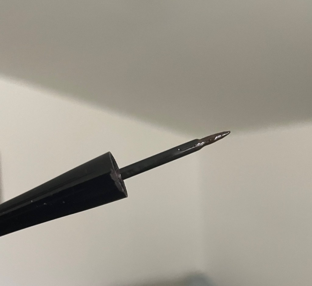 Wet n Wild H2O Proof Felt Tip Liquid Eyeliner in Dark brown felt tip applicator.