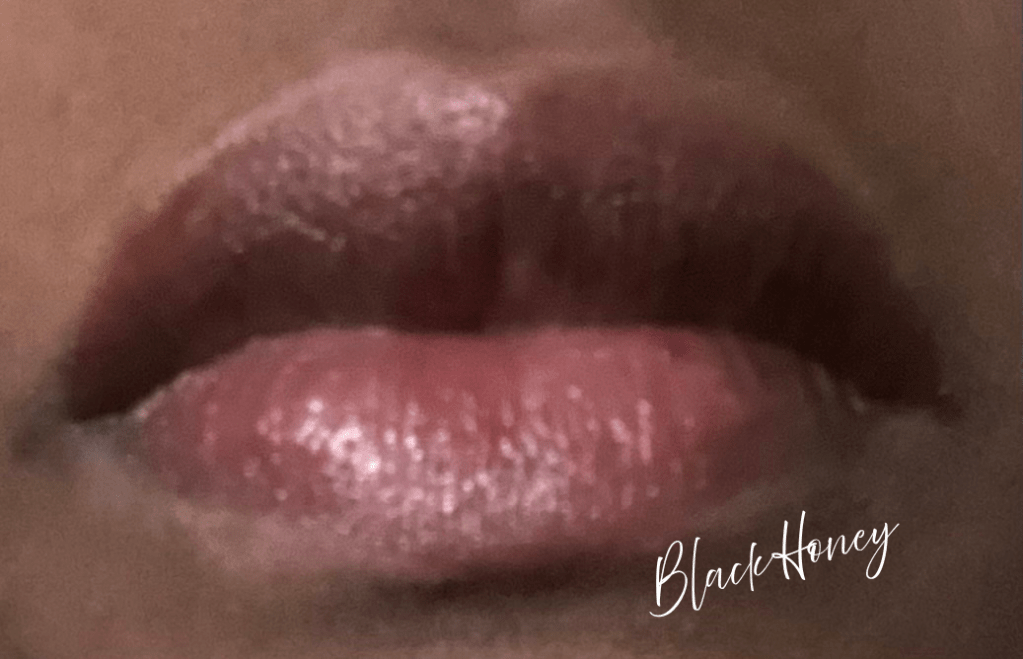 Clinique black Honey worn on deep skin.