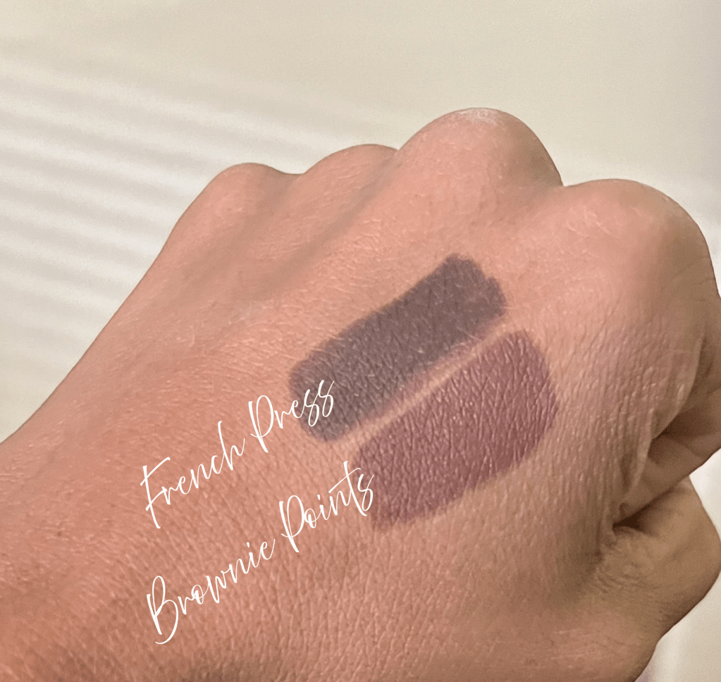 E.l.f. Kohl Eyeliners Brownie Points and French Roast swatched on brown skin.