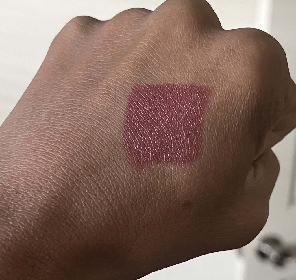 Mac Del Rio swatch on brown skin.