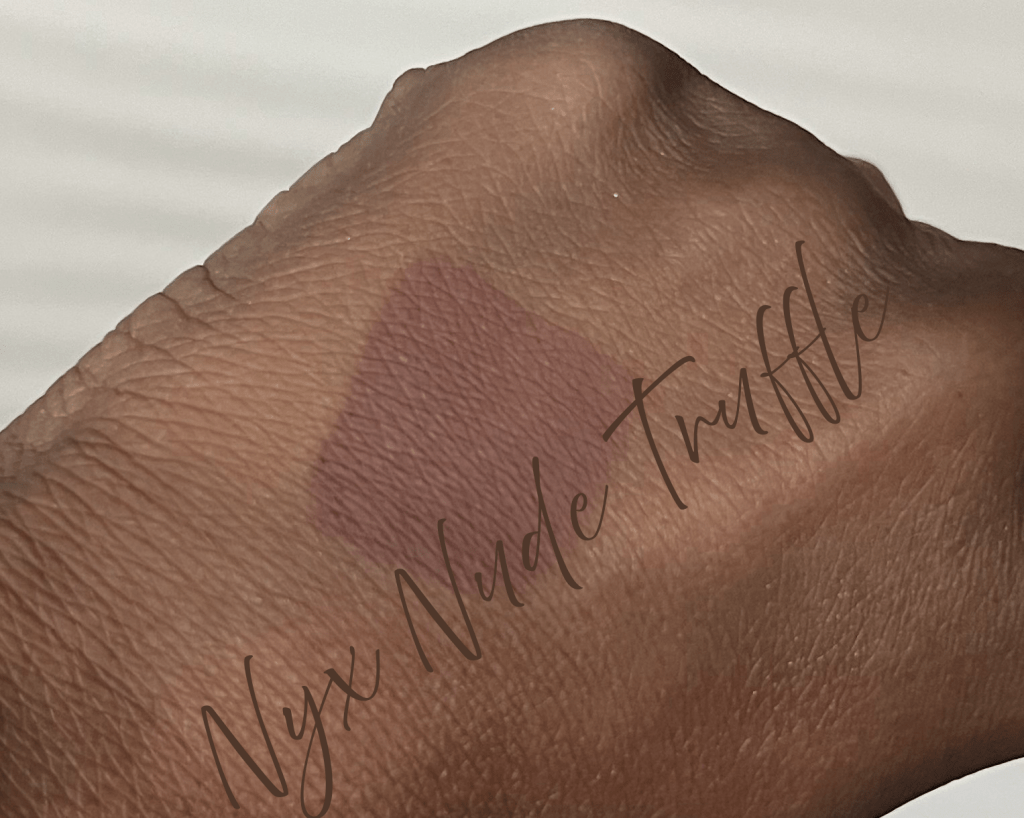 Nyx Nude Truffle lip liner swatch on brown skin.